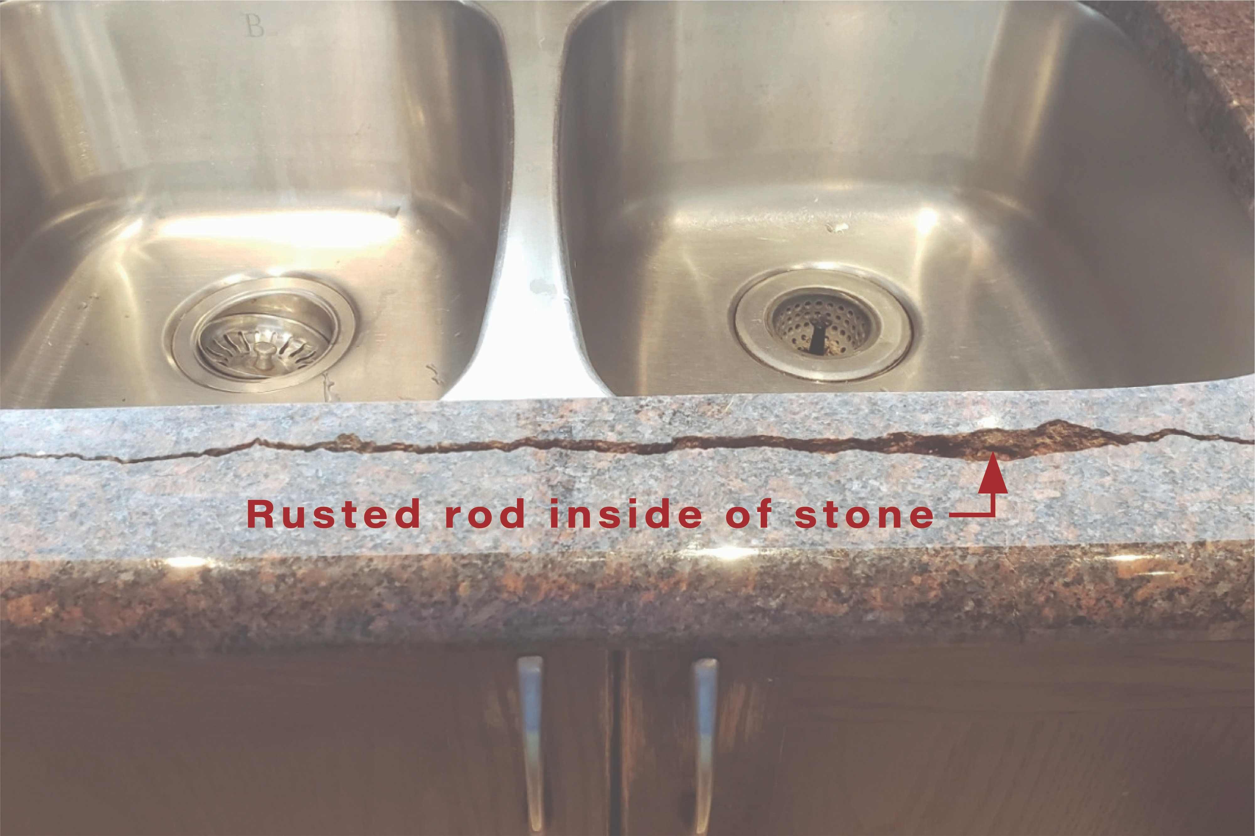 crack caused by a rusted metal support rod