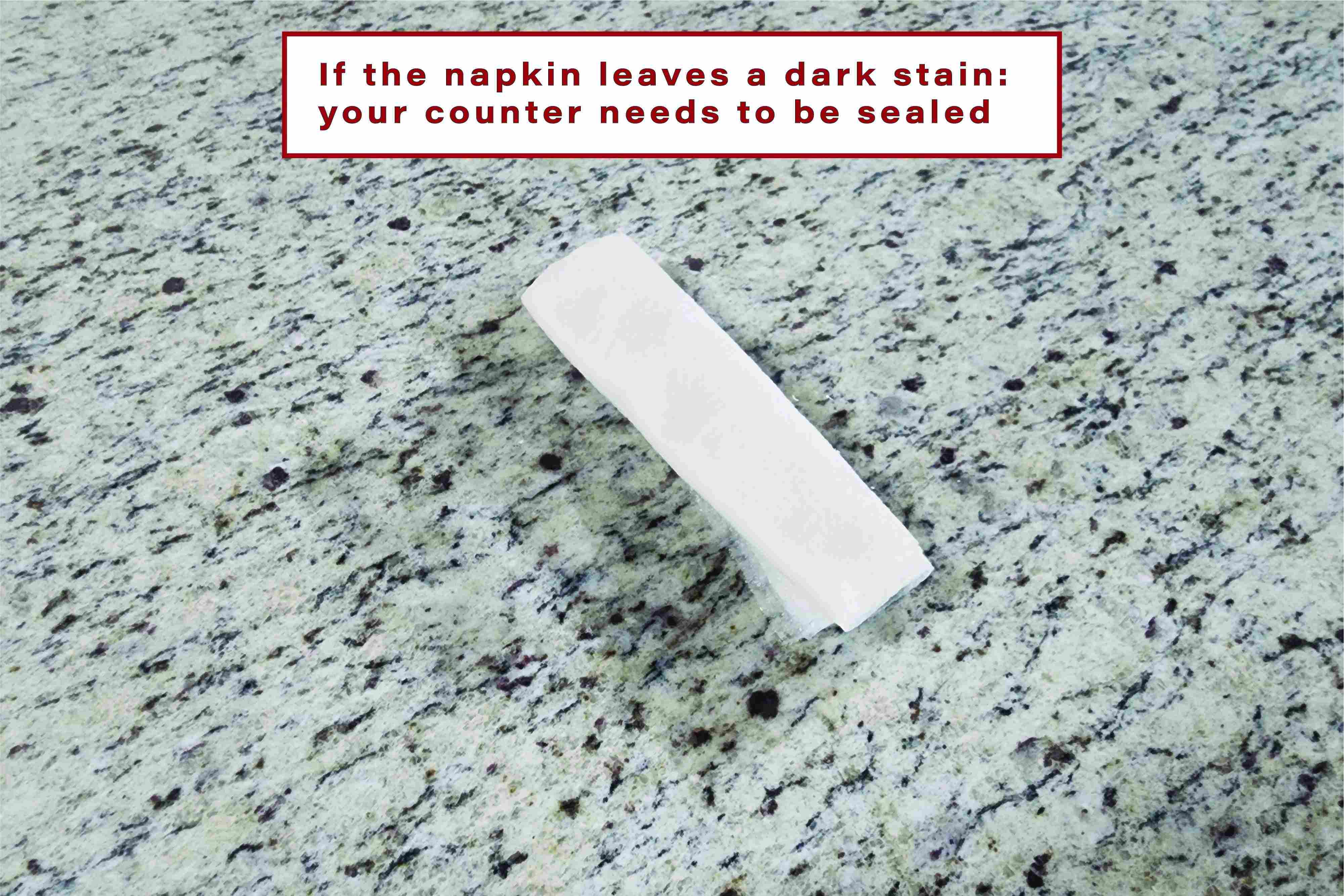 stain left by wet napkin on granite
