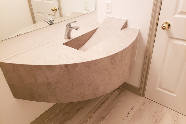 Curved Quartz Vanity with Integrated Sink